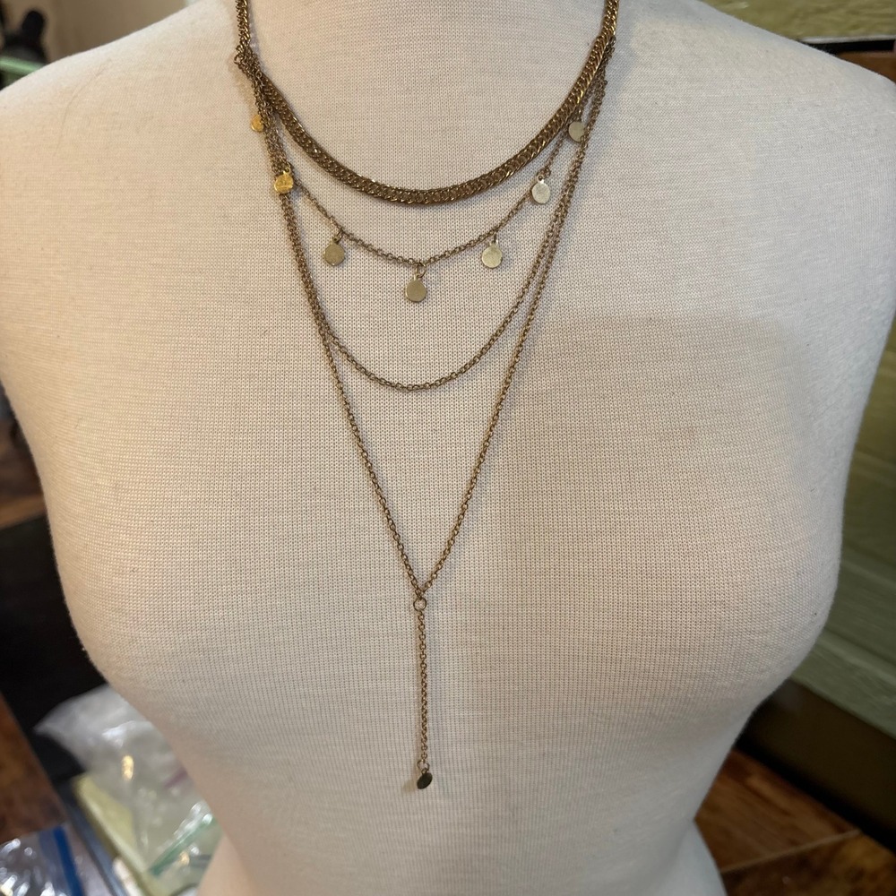 JS Gold Tone Multi Strand Layered Necklace with Disc Charms and Lariat Drop